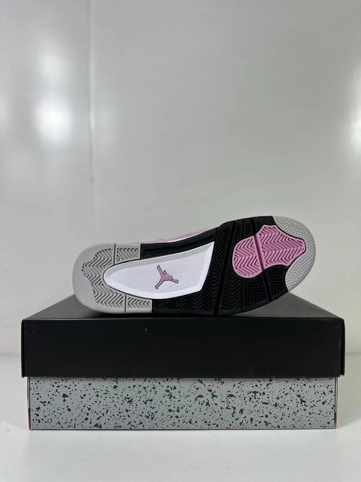 Air Jordan 4 Retro Orchid Pink Sneakers AQ9129-501 - product image from the listing.