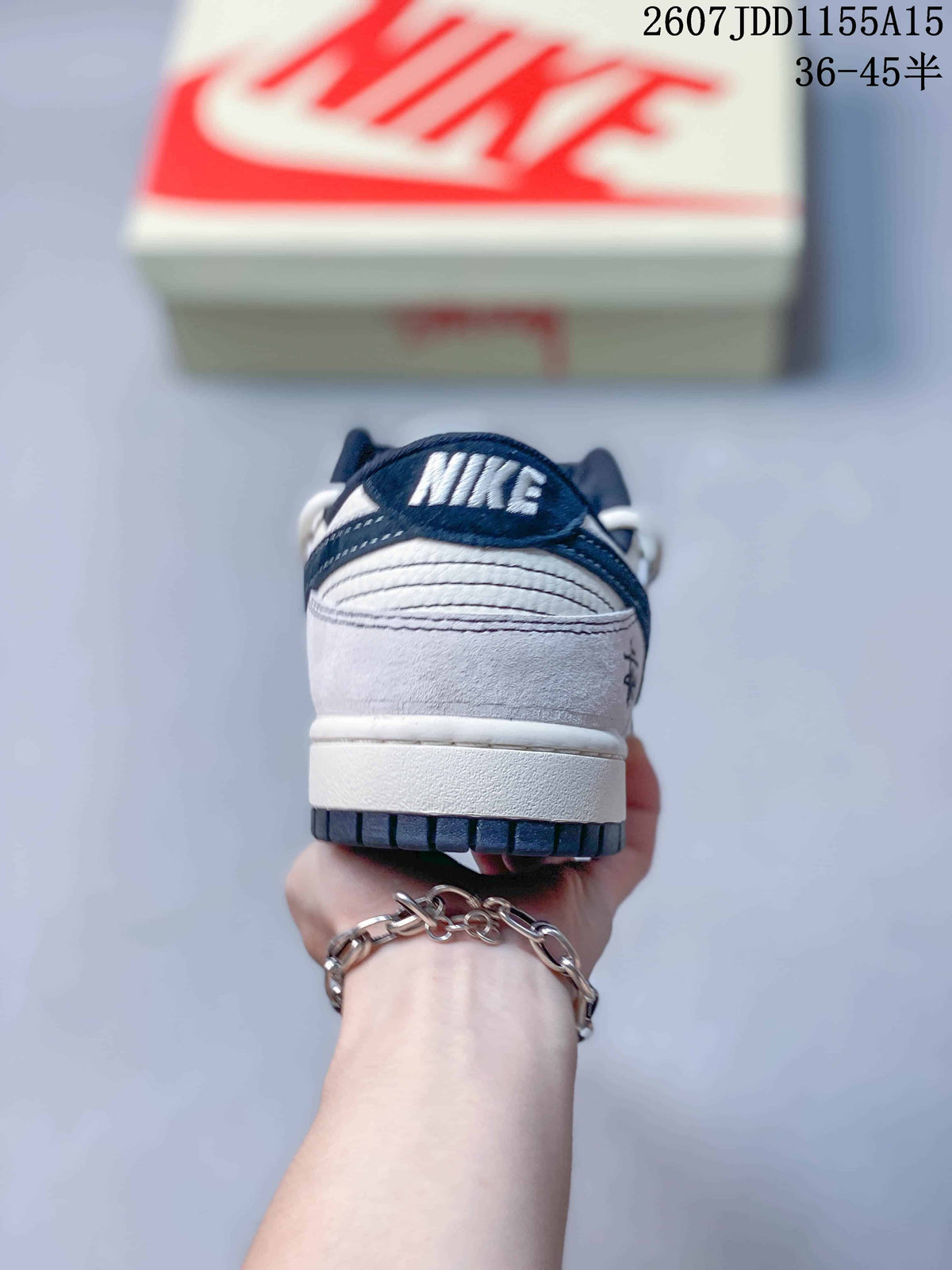 Nike SB Dunk Low Sneakers in Gray White Navy - product image from the listing.