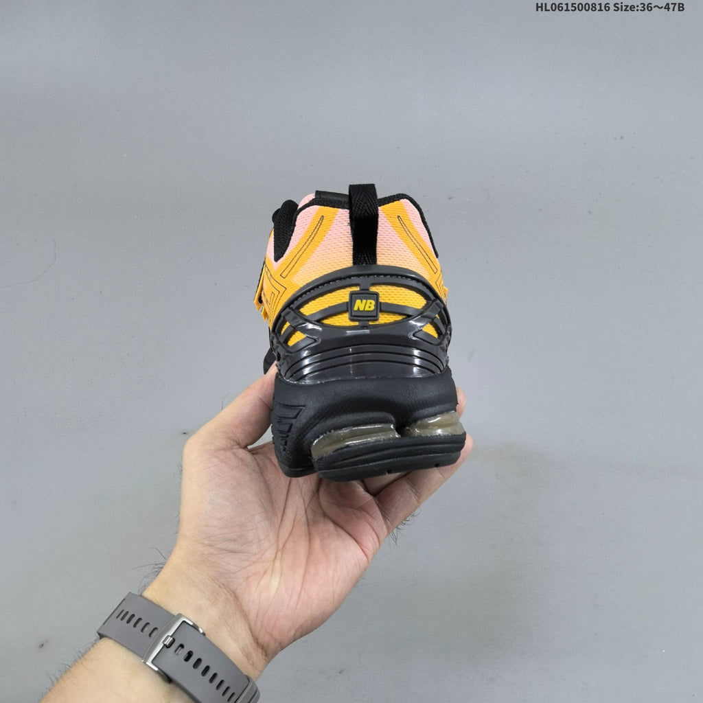 New Balance M1906R Sneakers in Pink Yellow Black U1906596 - product image from the listing.