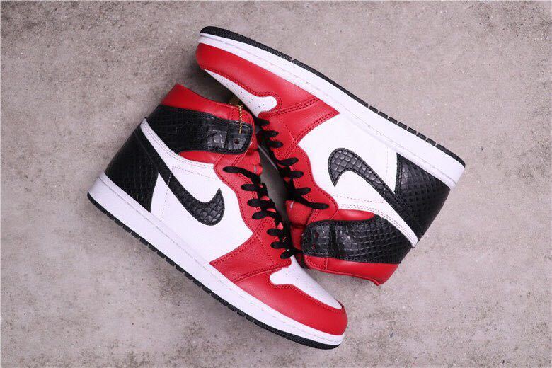 Women's Air Jordan 1 Satin Snake High-Top Sneakers CD0461-601 - product image from the listing.