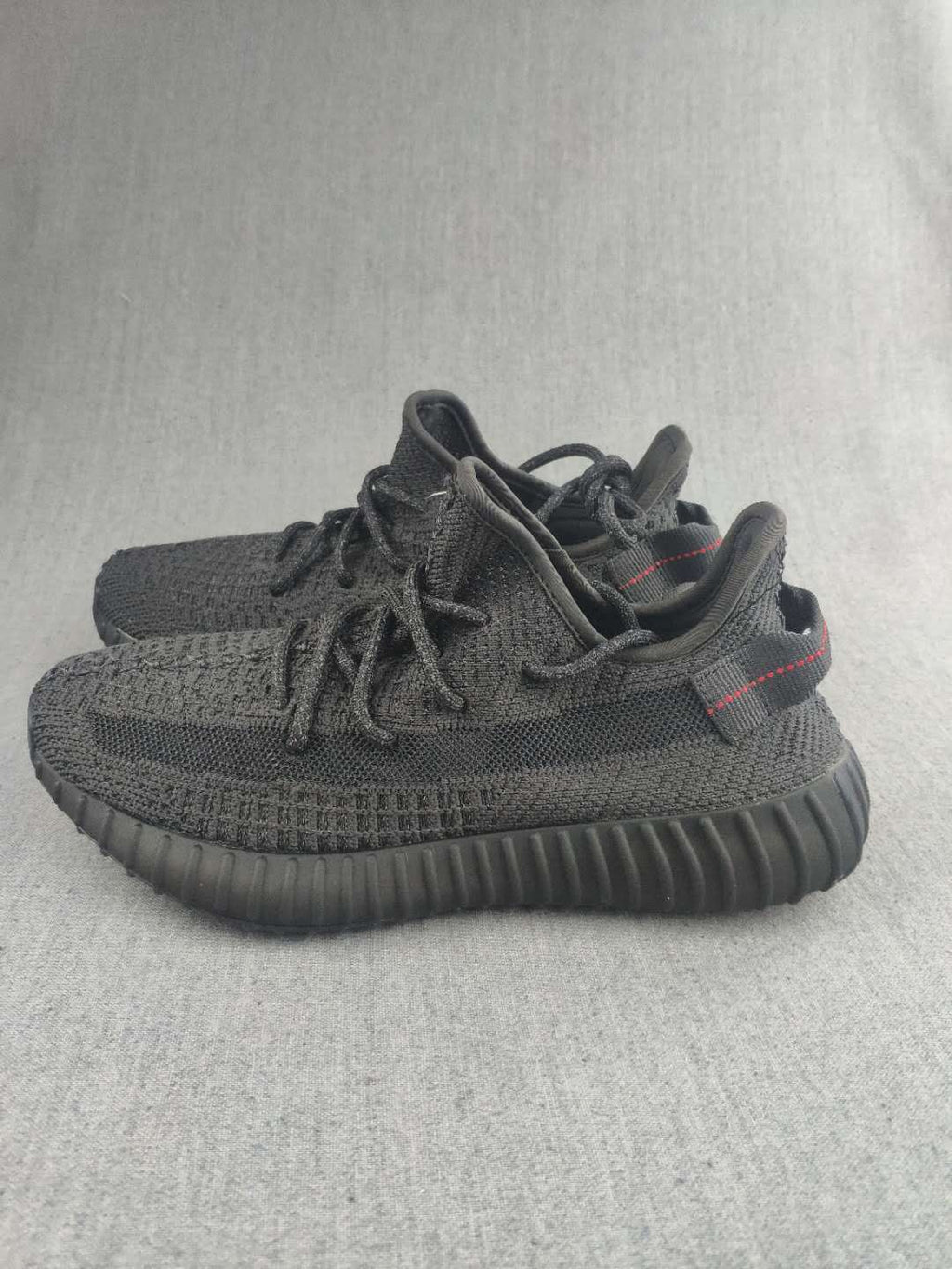Yeezy Boost 350 V2 Sneakers in Dark Gray Knit - product image from the listing.