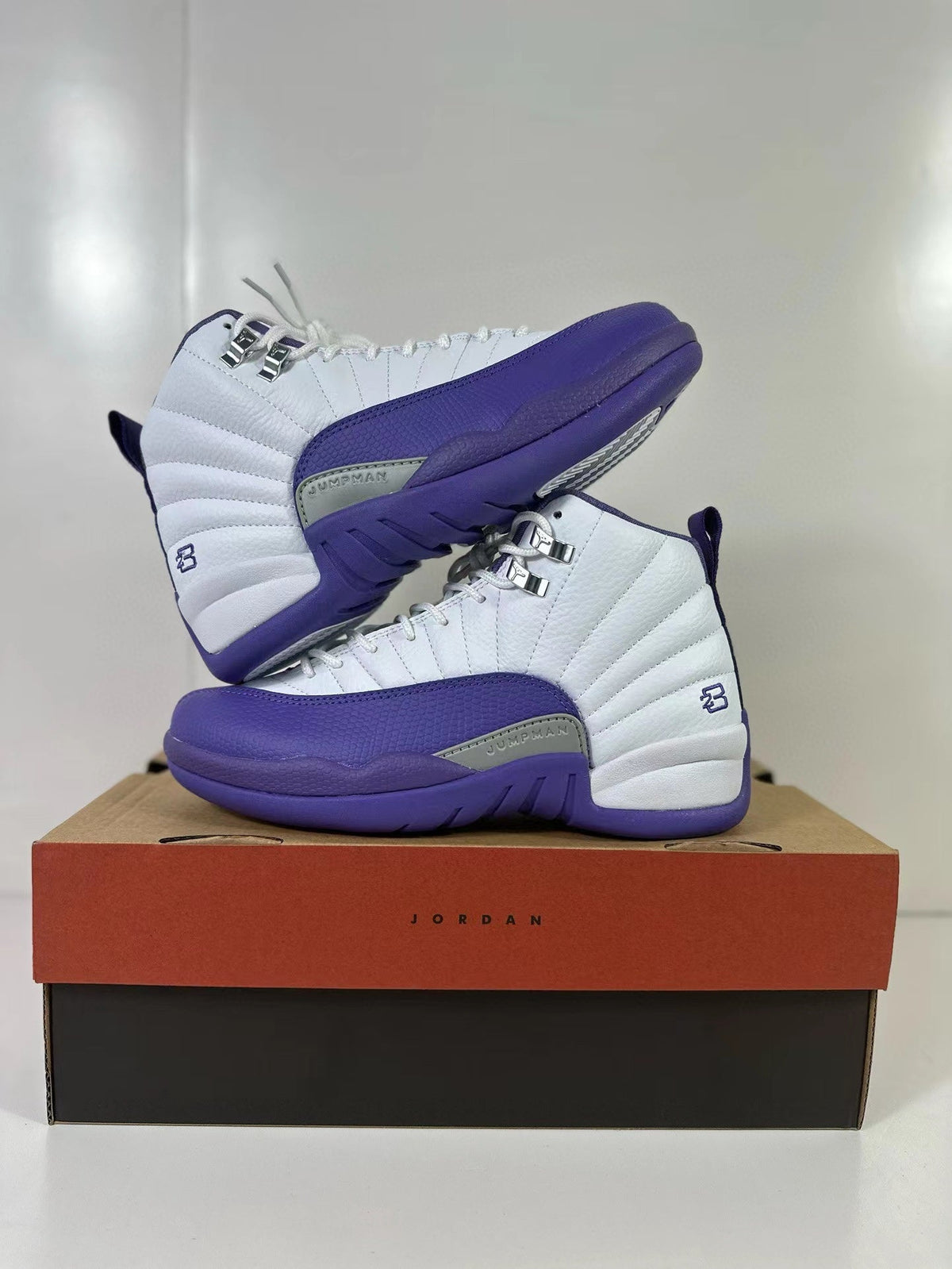 Air Jordan 12 Retro White Purple CT8013-150 Sneakers - product image from the listing.