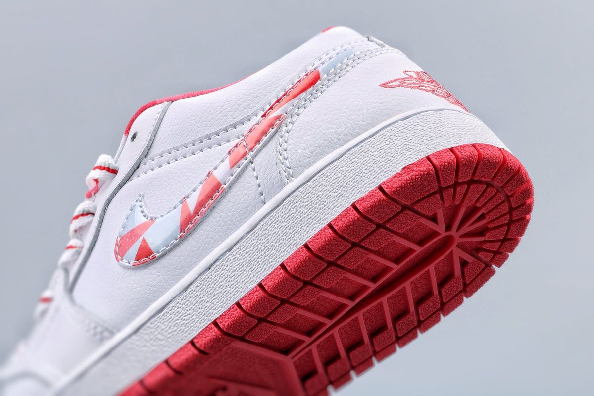 Women's Nike Air Jordan 1 Low White and Pink Sneakers - product image from the listing.