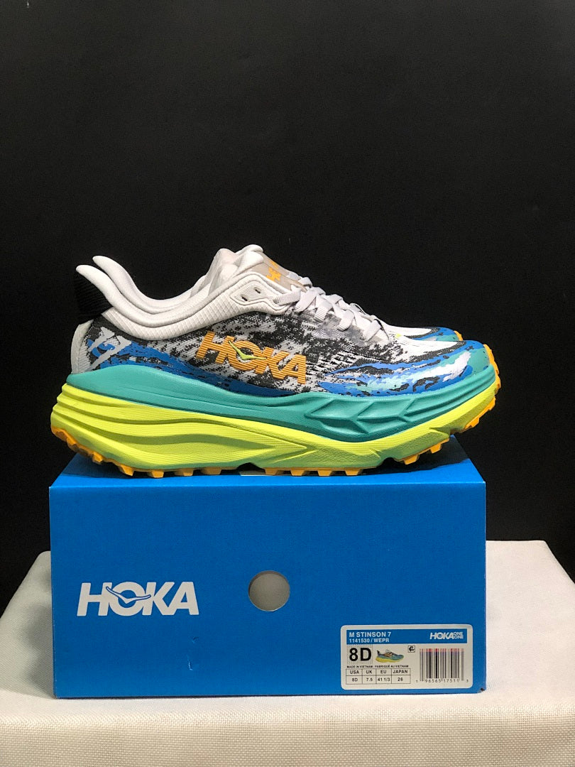 Blue and Lime HOKA Stinson 7 Trail Sneakers - product image from the listing.