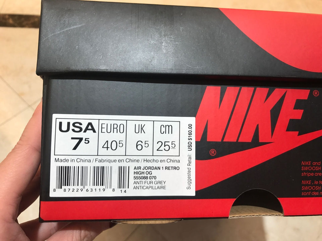 Jordan 1 Retro High OG High-Top Sneakers in Grey Green - product image from the listing.