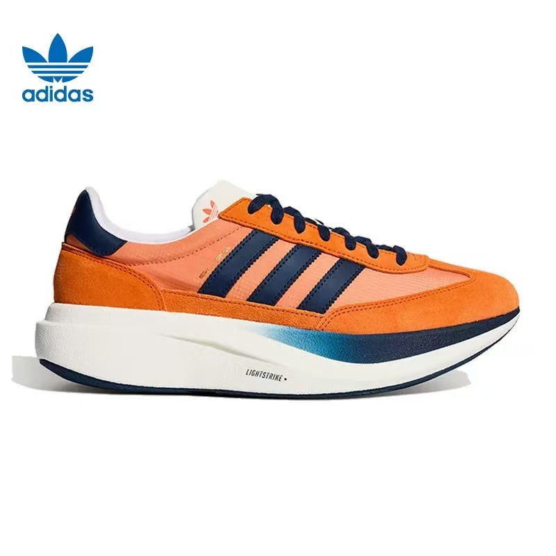 adidas Lightstrike Sneakers in Orange and Navy - product image from the listing.