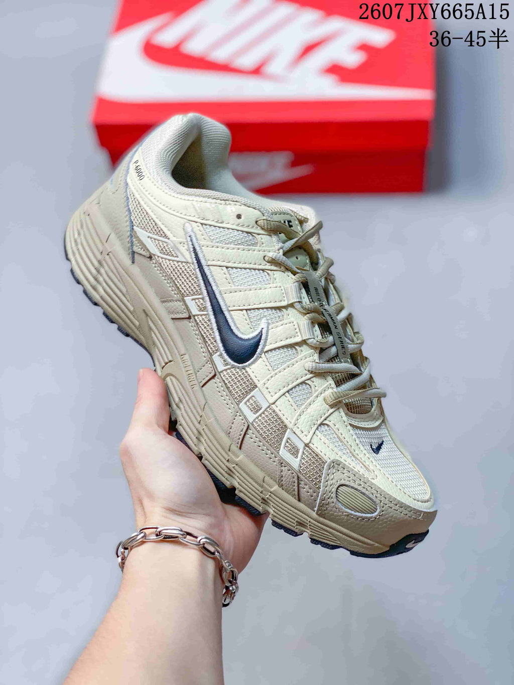 Nike P-6000 Trainers Cream Navy Style 2607JXY665A15 - product image from the listing.