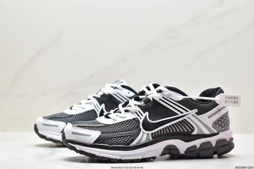 Nike Air More Uptempo Sneakers in Black and White - product image from the listing.