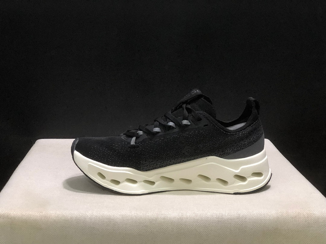 On Cloudsurfer Max Running Sneakers in Black and White - product image from the listing.
