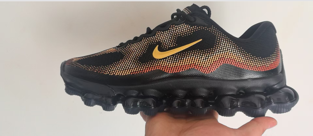 Nike Air Liquid Max Running Sneakers, in Black and Coral - product image from the listing.