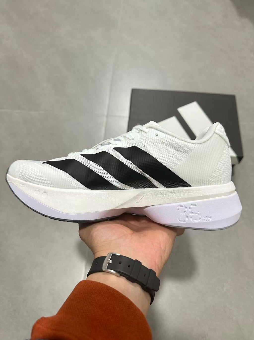 adidas Adizero Lightstrike Pro Running Shoes in White Black JS4939 - product image from the listing.