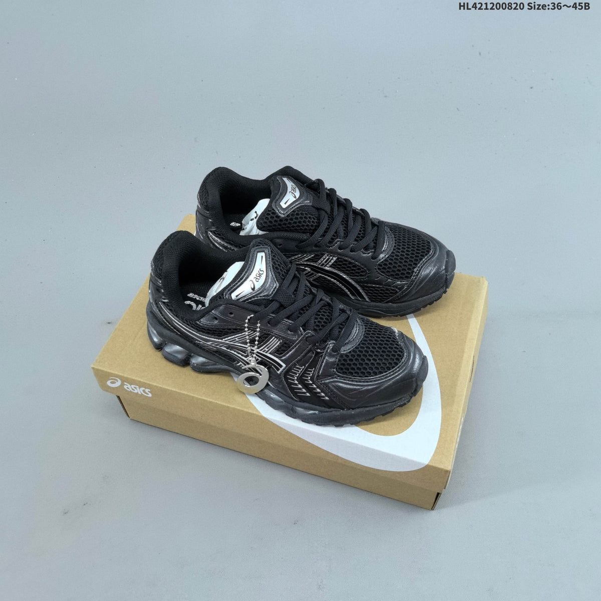 ASICS Gel-Kayano 14 Mesh Sneakers for Running - product image from the listing.