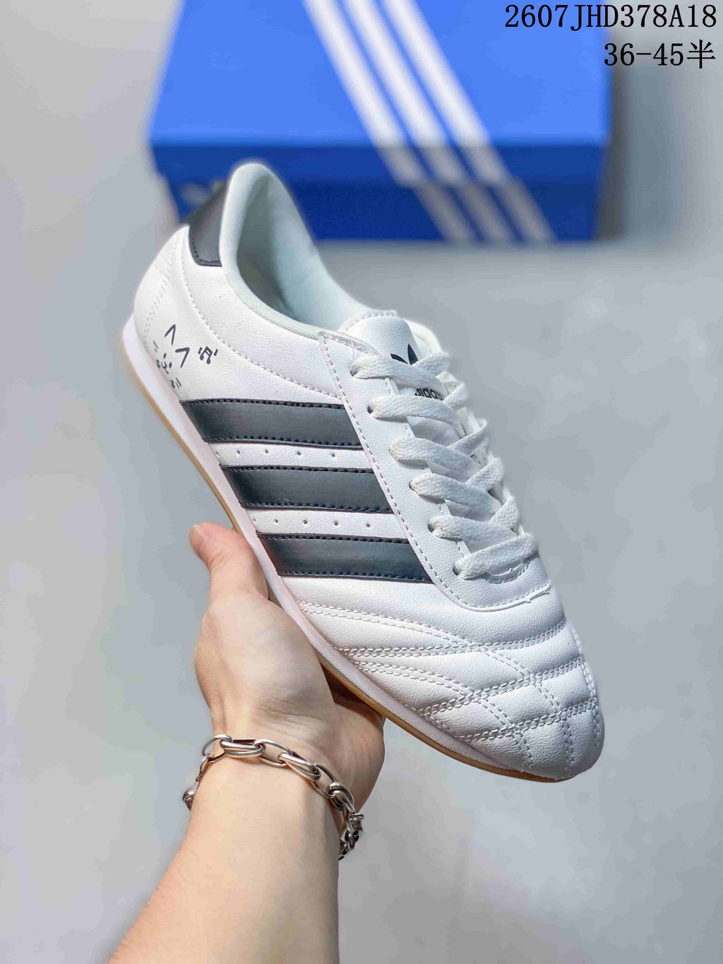adidas Taekwondo SMIL-LS Sneakers in White Black 2607JHD378A18 - product image from the listing.