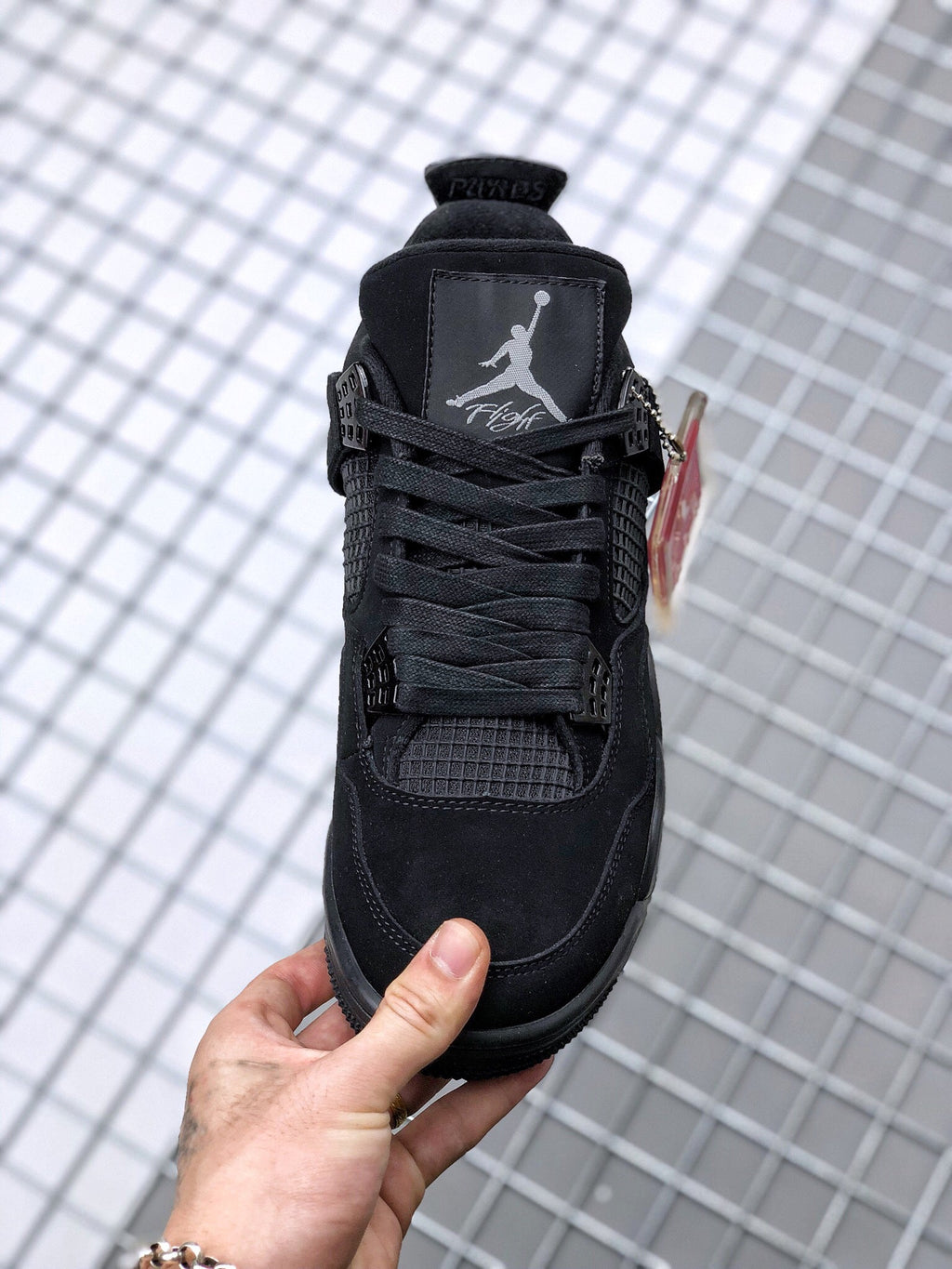 Air Jordan 4 Black Cat Sneakers CU1110-010 - product image from the listing.