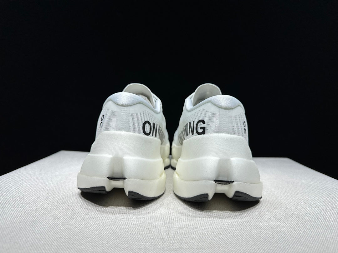 On Cloudboom Max Running Shoes in White - product image from the listing.