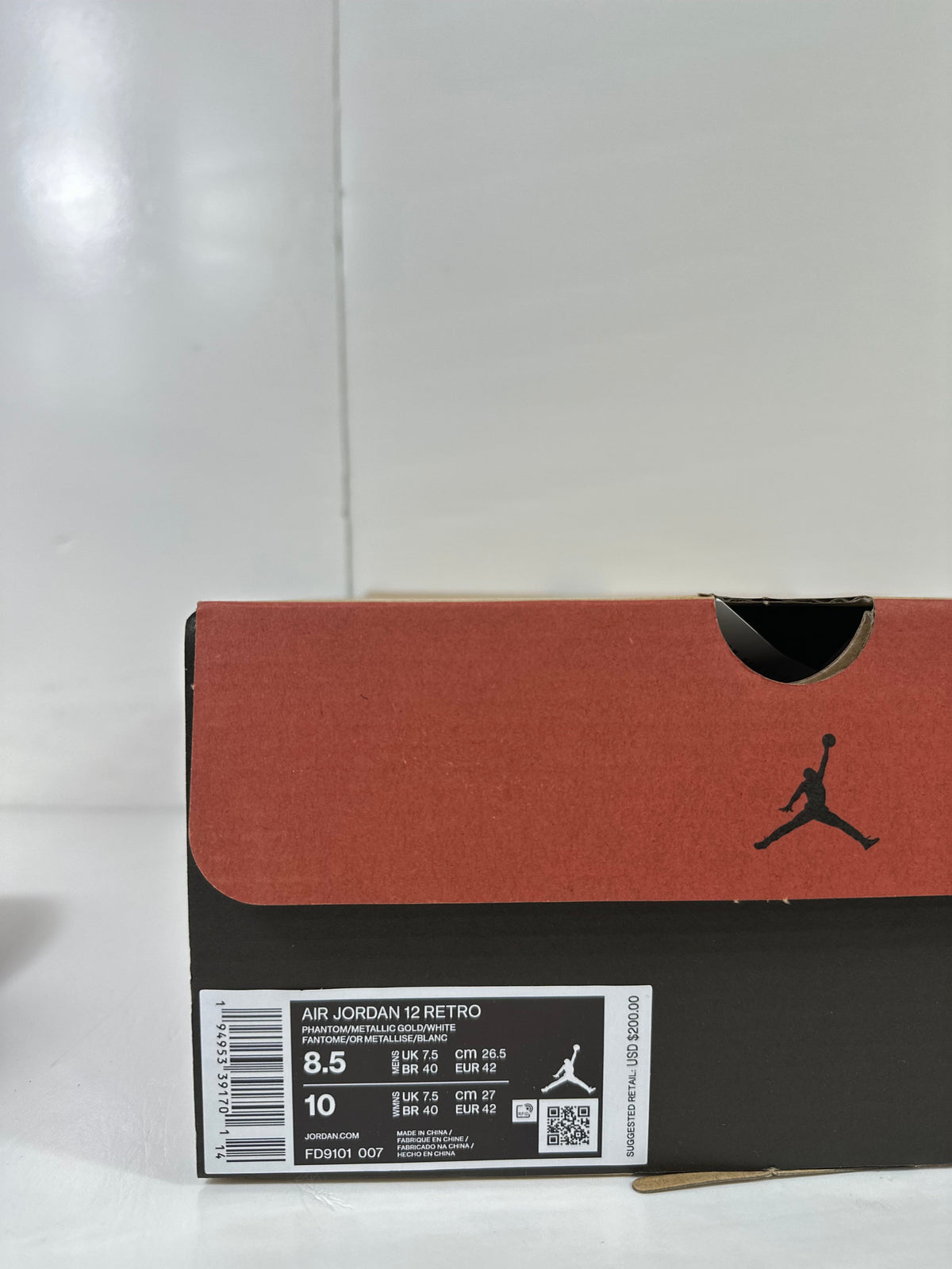 Air Jordan 12 Phantom White Metallic Gold Sneakers FD9101-007 - product image from the listing.