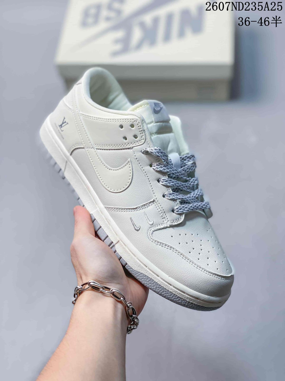 Nike SB Dunk Low Pro Sneakers in White Grey 2607ND235A25 - product image from the listing.