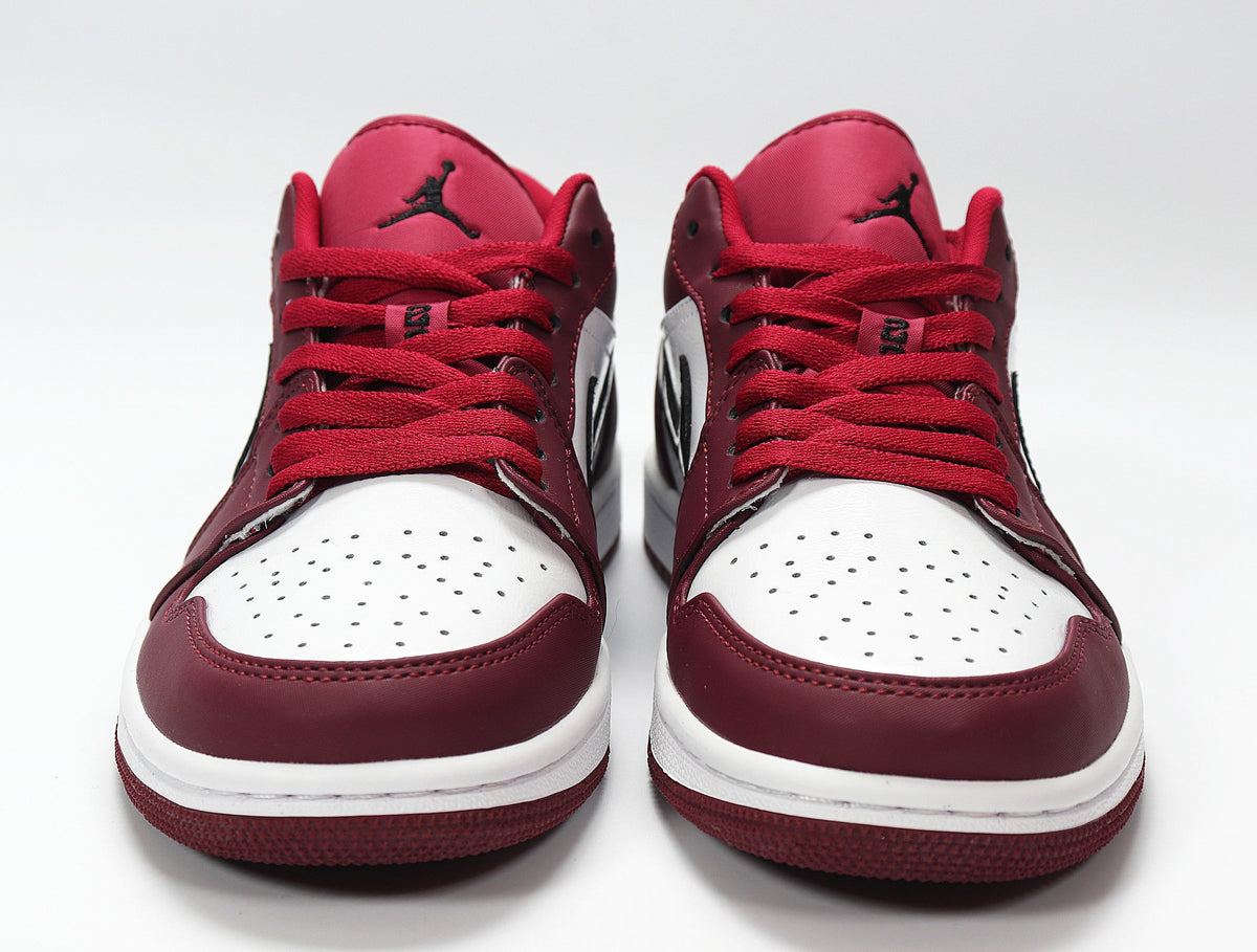 Jordan 1 Low White and Rose Sneakers in Red 553558-604 - product image from the listing.