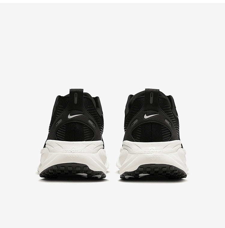 Nike Vomero 18 Running Shoes in Black White HM6803-007 - product image from the listing.