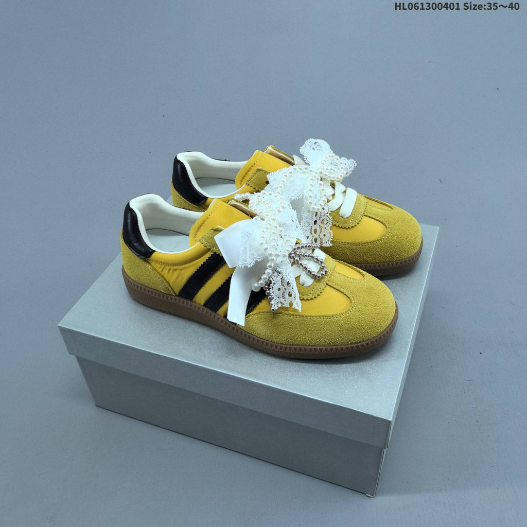 Ribbon and Pearl Bow Low-Cut Sneakers - product image from the listing.