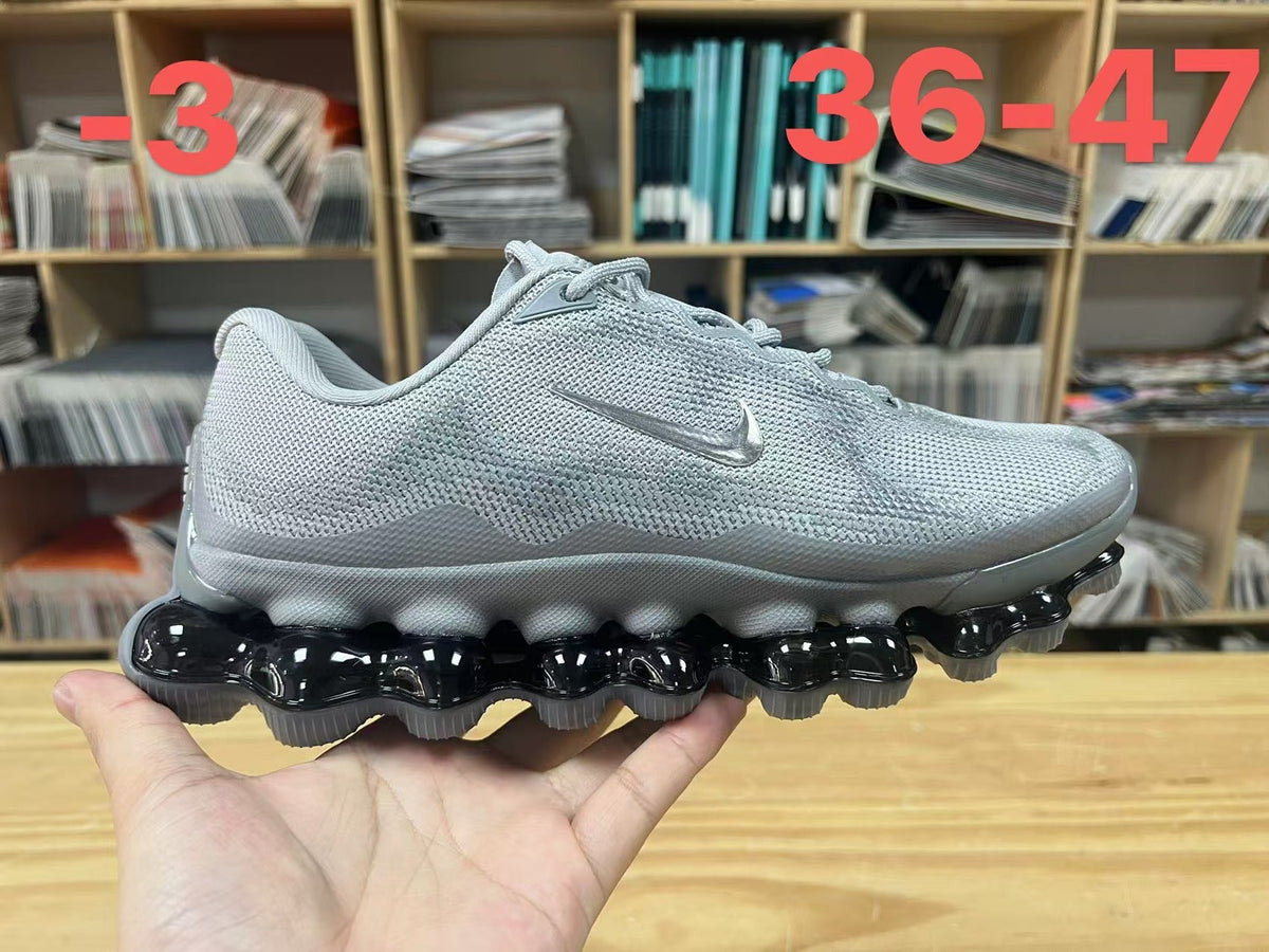 Nike Air Liquid Max Running Sneakers, in Light Gray and Black - product image from the listing.