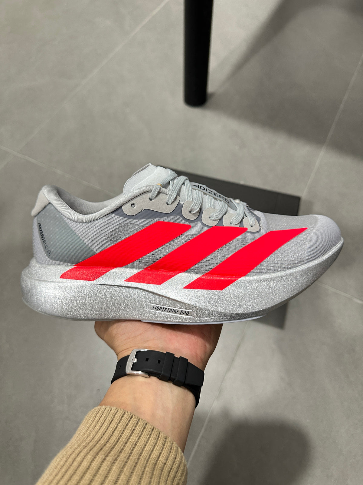 Adidas Lightstrike Pro Running Shoes, in Gray and Red KI3381 - product image from the listing.