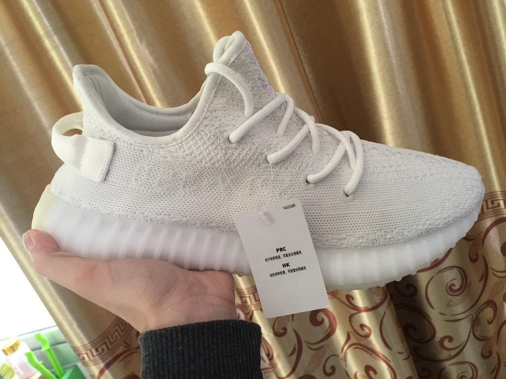 Yeezy 350 V2 Low-Top Sneakers in White Knit - product image from the listing.