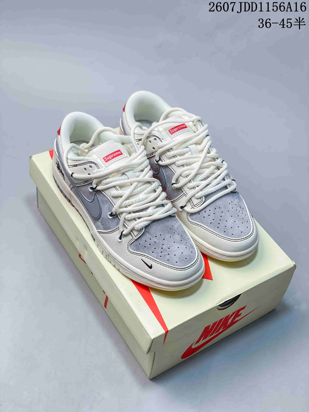 Nike SB Dunk Low Supreme-Style Sneakers in White Grey - product image from the listing.
