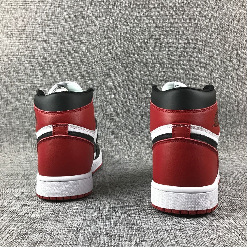 Black Toe Sneakers - Air Jordan 1 High 555088-184 - product image from the listing.