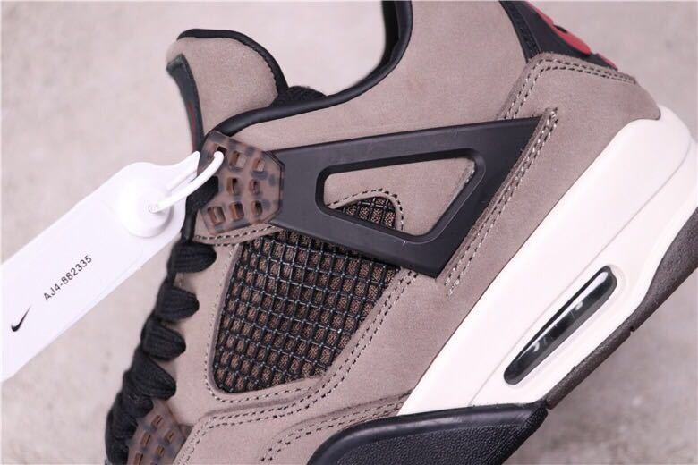 Women's Air Jordan 4 Rasta Sneakers - product image from the listing.