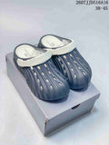 Navy and White Balenciaga Logo Slide Sandals 2607JJD516A16 - product image from the listing.
