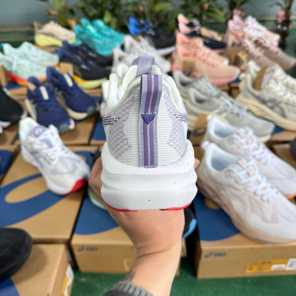 ASICS NOVABLAST 5 LE Running Shoes in White Purple - product image from the listing.