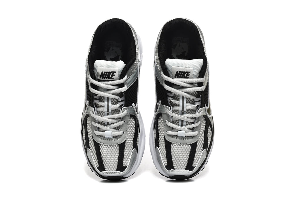 Nike Silver and Black Mesh Trainers - product image from the listing.