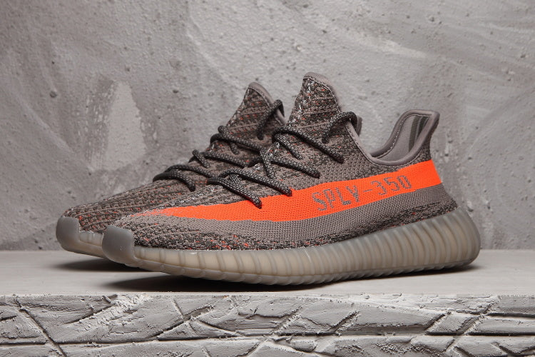 Charcoal and Bright Orange Yeezy 350 V2 Sneakers - product image from the listing.