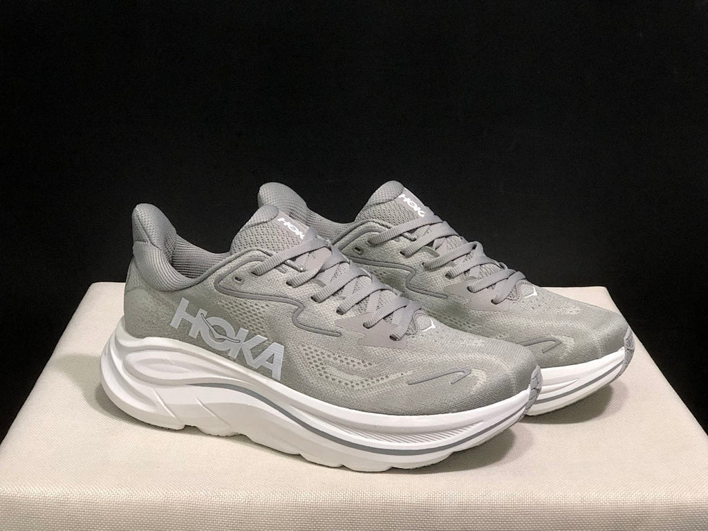 Gray HOKA Clifton 10 Running Shoes - product image from the listing.