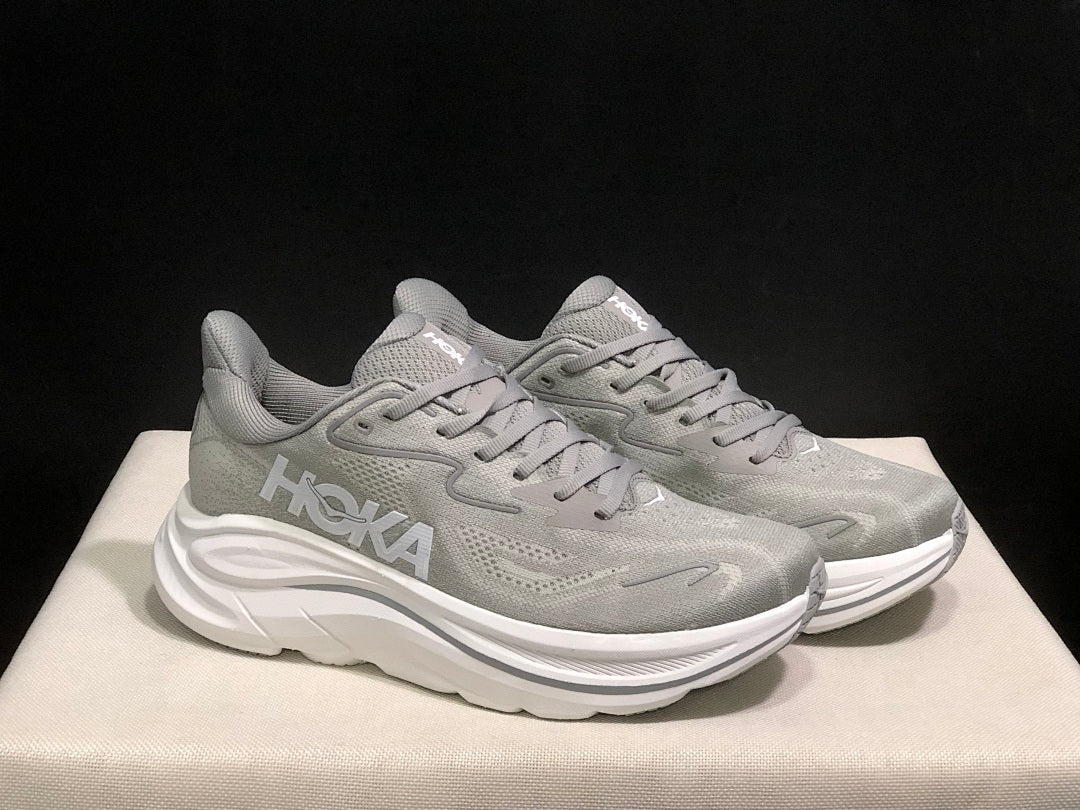 Gray HOKA Clifton 10 Running Shoes - product image from the listing.