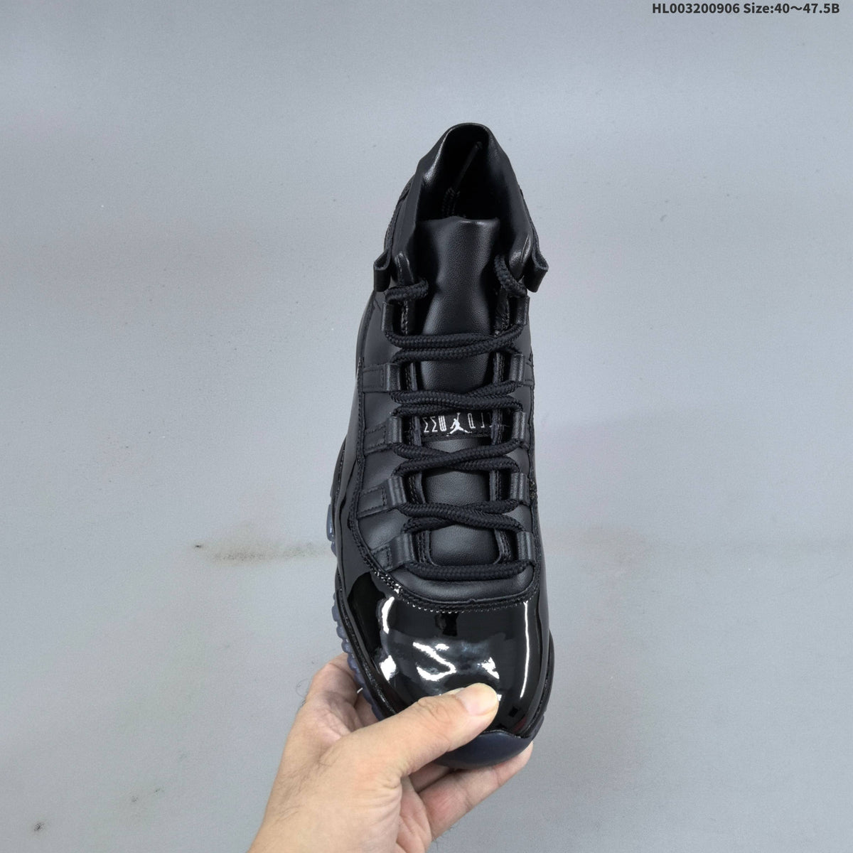 Jordan 11 High CDG Sneakers in Black - product image from the listing.