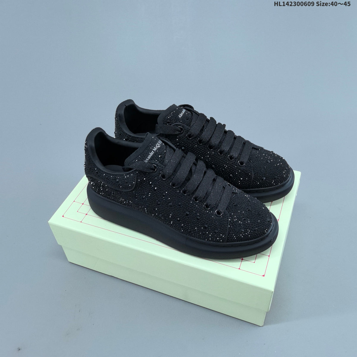 Alexander McQueen Black Crystal-Embellished Sneakers in Leather - product image from the listing.