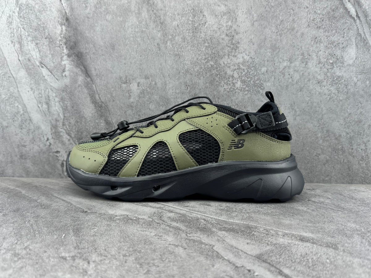 New Balance Green and Black Mesh Trainers - product image from the listing.