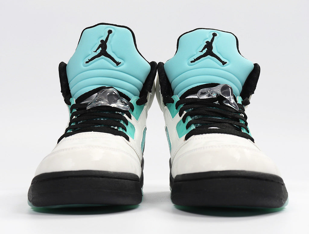 Jordan 4 Retro Sneakers in White and Mint CN2932-100 - product image from the listing.
