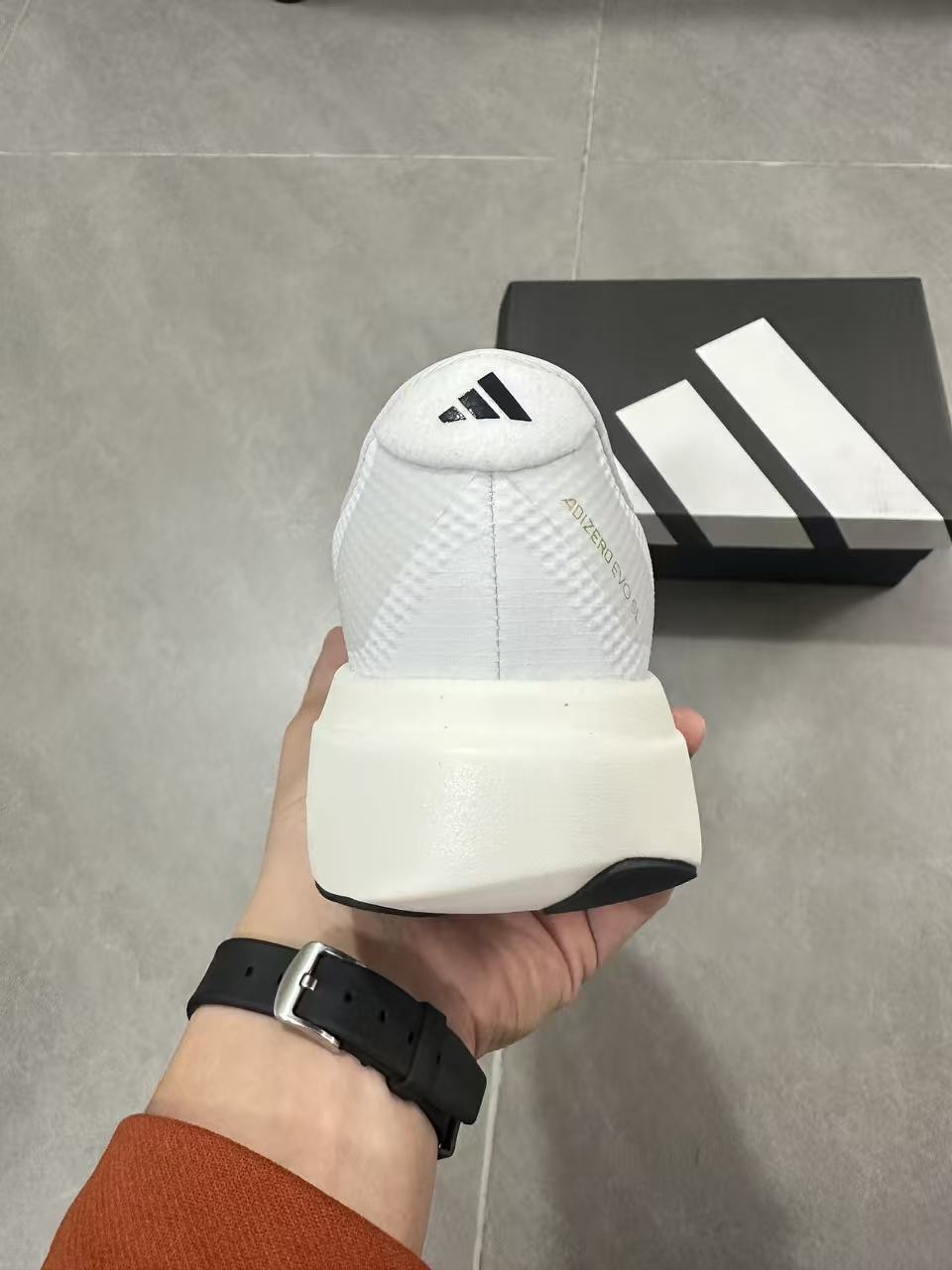 Adidas Lightstrike Pro Running Shoes in White Gold JQ4441 - product image from the listing.