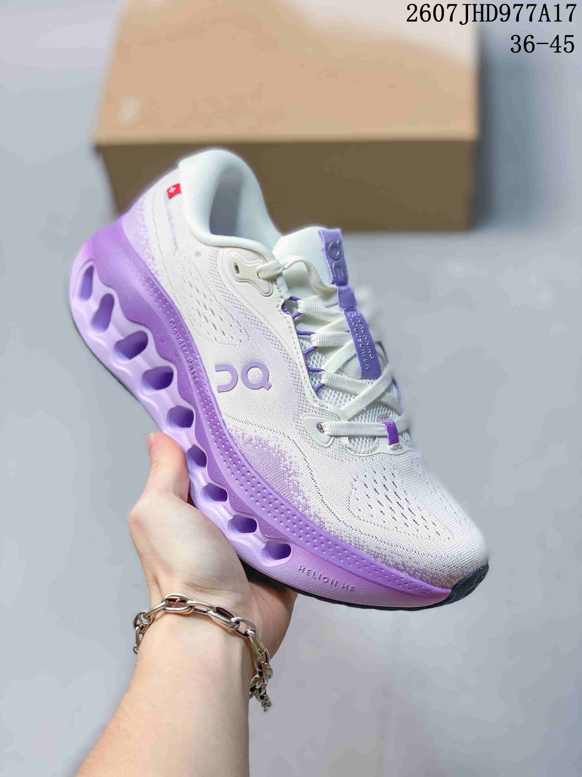 On Cloudtilt Trainers White with Purple or Orange Accents - product image from the listing.
