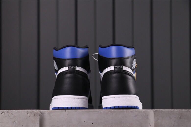 Air Jordan 1 Game Royal High-Top Sneakers in Black Blue White - product image from the listing.