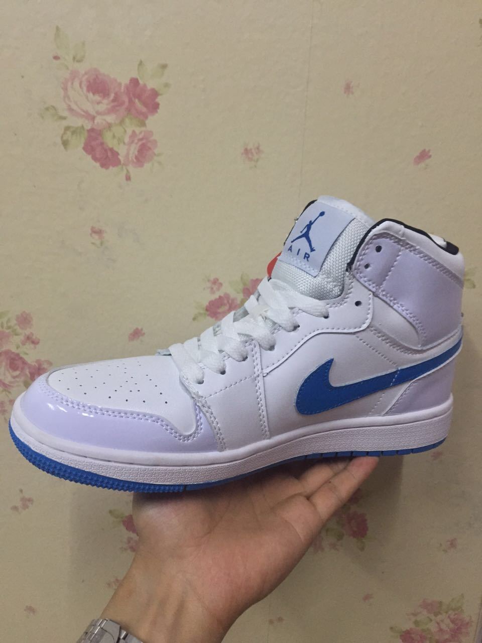 Air Jordan 1 High White and Royal Blue Sneakers - product image from the listing.