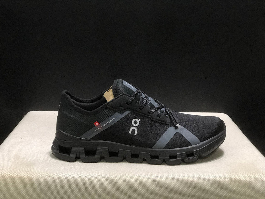 On Cloud X 4 AD Sneakers in Black - product image from the listing.
