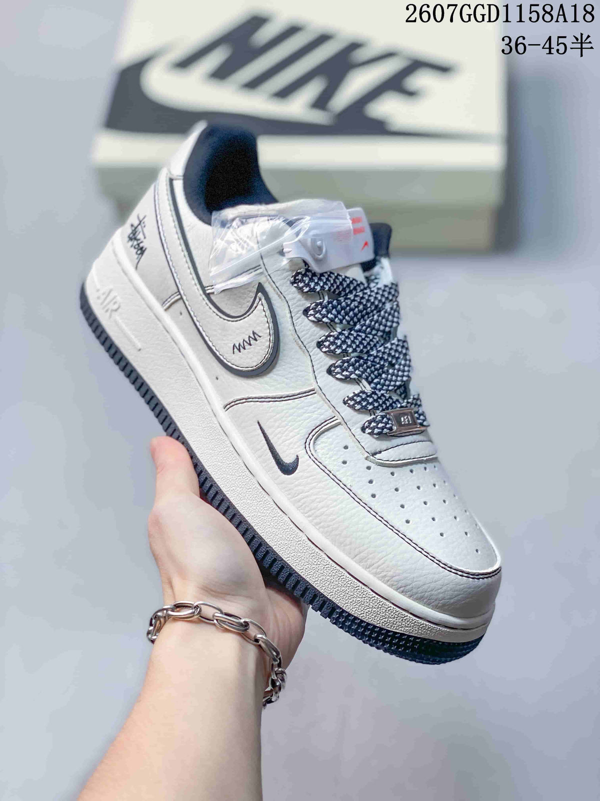 Nike Air Force 1 '07 Low-Top Sneakers in White Navy - product image from the listing.