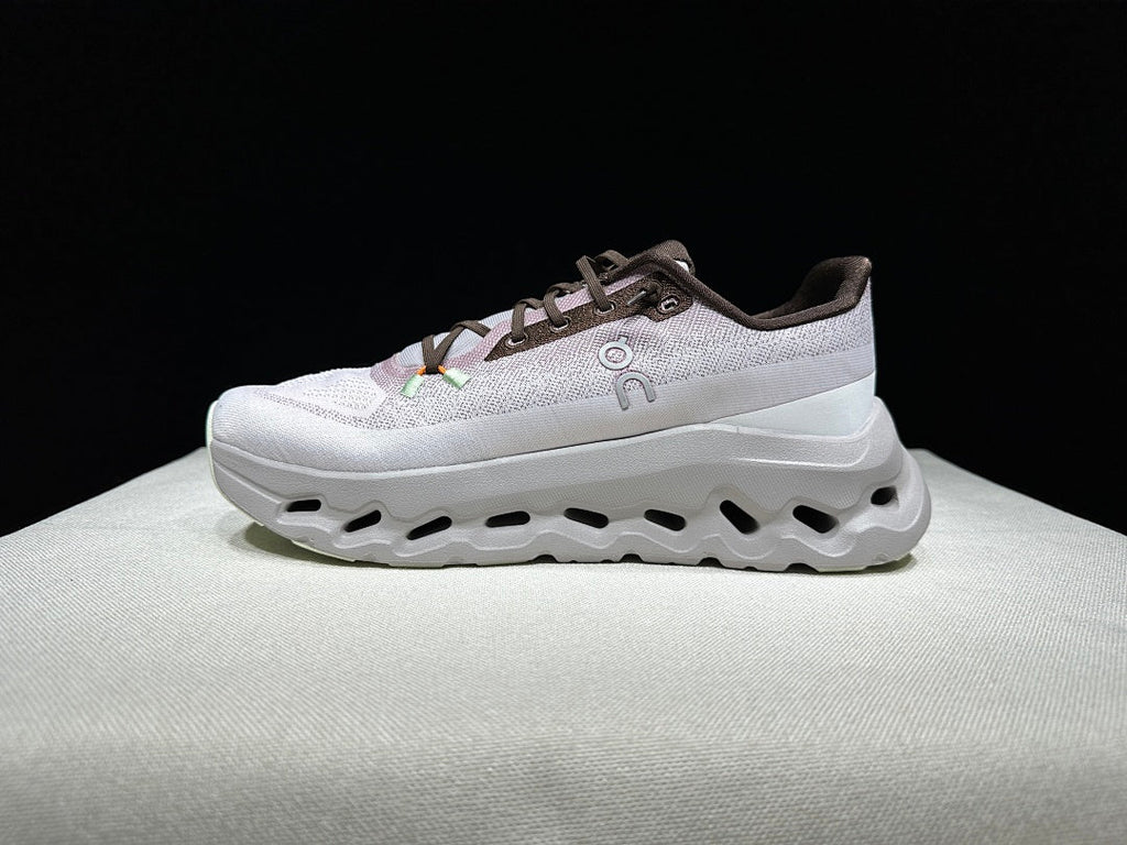 On Cloudtilt Sneakers in Blush in Pink and Pearl White - product image from the listing.