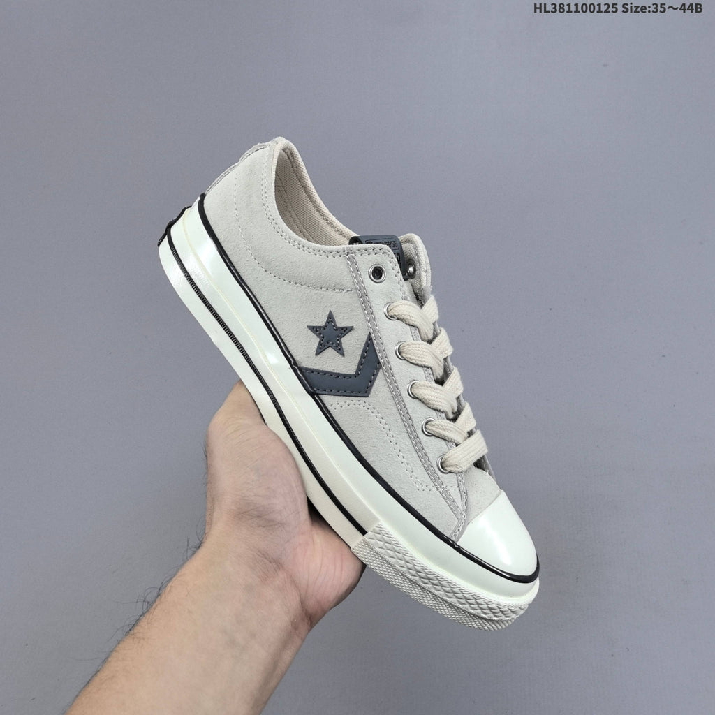 Converse Star Player Ox Low-Cut Sneakers in Navy/White - product image from the listing.