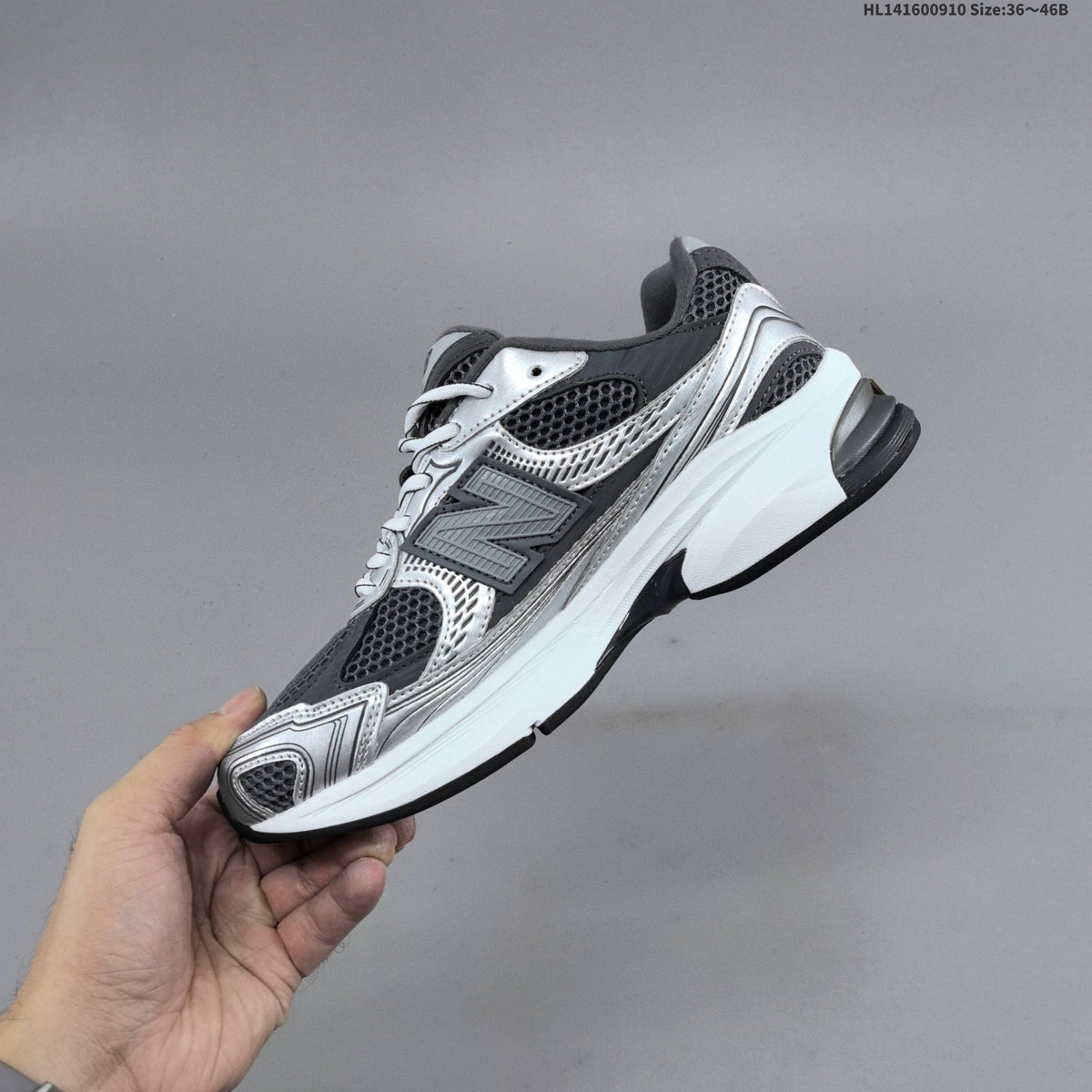 Silver and Charcoal New Balance 2010 Sneakers - product image from the listing.