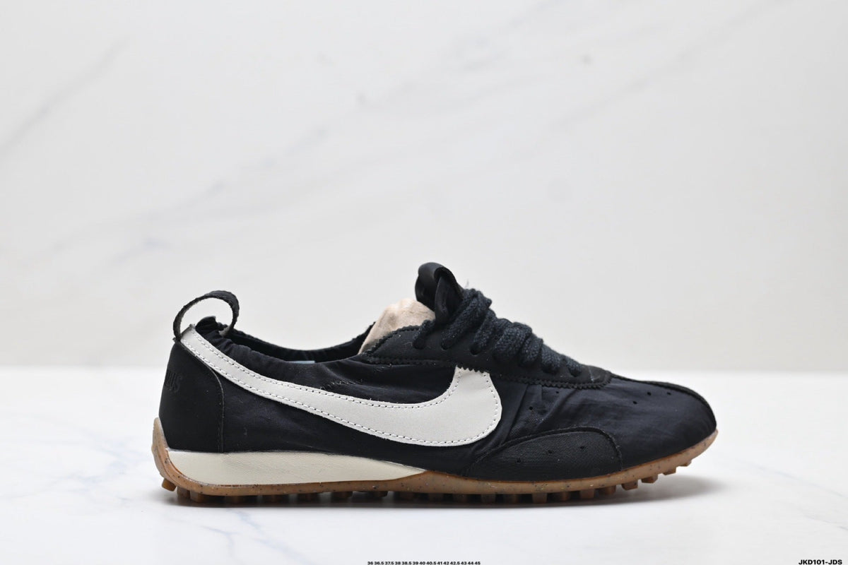 Jacquemus x Nike Jacumoon Sneakers in Black and White - product image from the listing.